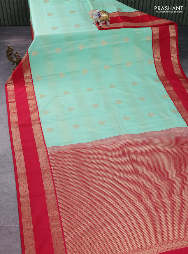 Semi kanchipuram silk saree teal green shade and red with allover zari weaves & buttas and rettapet zari woven korvai border