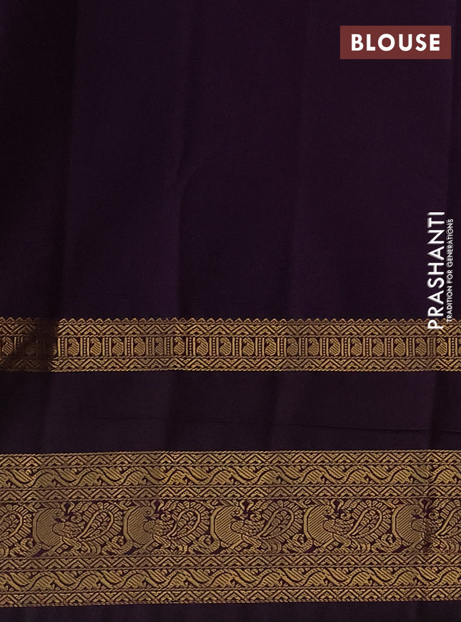 Semi kanchipuram silk saree teal blue and deep purple with allover zari weaves & buttas and rettapet zari woven korvai border