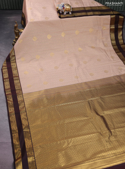 Semi kanchipuram silk saree sandal and brown with allover zari weaves & buttas and rettapet zari woven korvai border