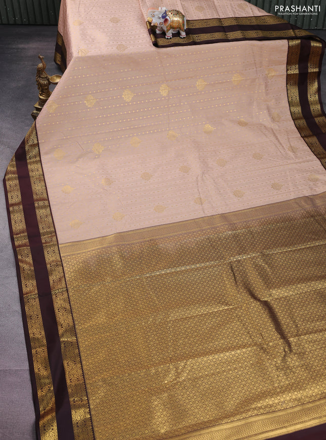 Semi kanchipuram silk saree sandal and brown with allover zari weaves & buttas and rettapet zari woven korvai border