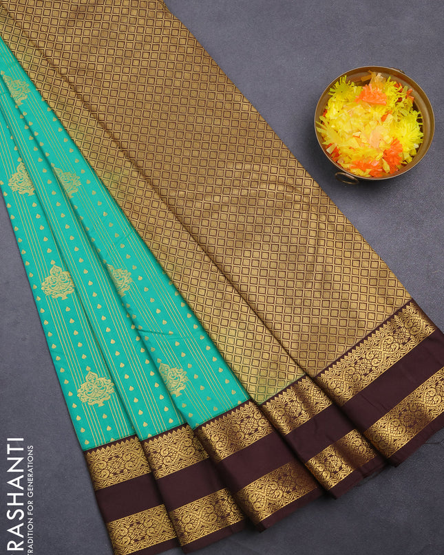 Semi kanchipuram silk saree teal green and brown with allover zari weaves & buttas and rettapet zari woven korvai border