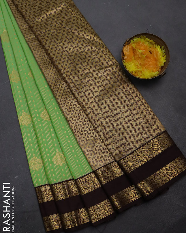 Semi kanchipuram silk saree pista green and brown with allover zari weaves & buttas and rettapet zari woven korvai border