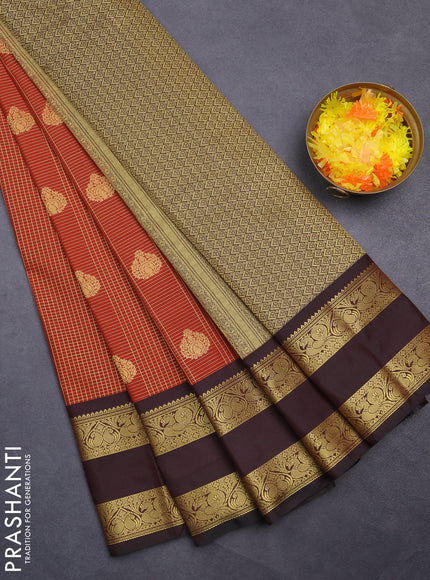 Semi kanchipuram silk saree rust shade and deep maroon with allover small zari checks & buttas and rettapet zari woven korvai border