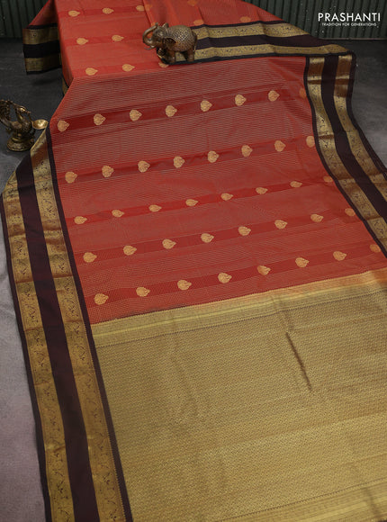 Semi kanchipuram silk saree rust shade and deep maroon with allover small zari checks & buttas and rettapet zari woven korvai border