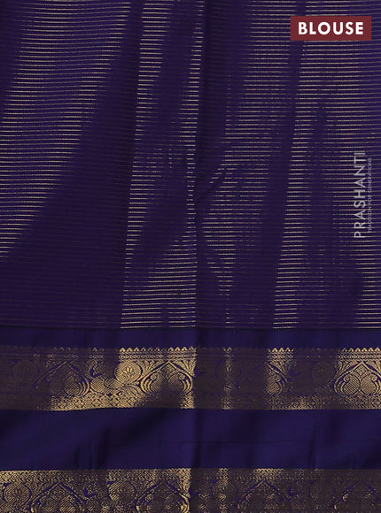 Semi kanchipuram silk saree light green and navy blue with allover small zari checks & buttas and rettapet zari woven korvai border