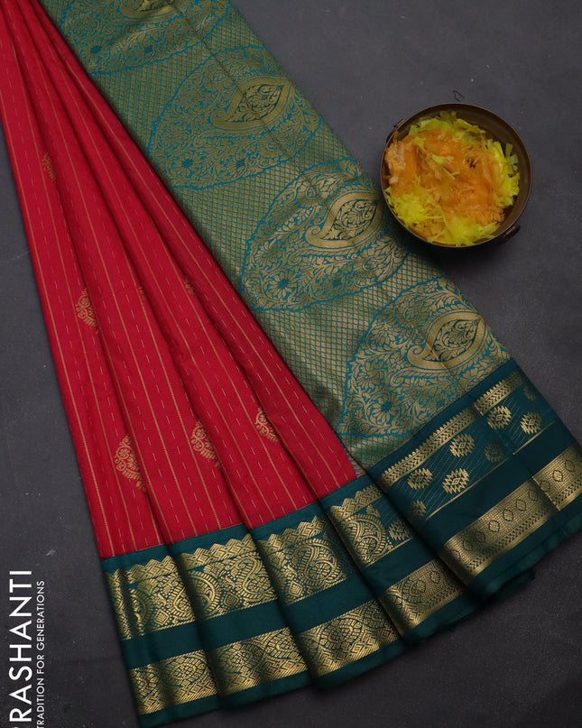 Semi kanchipuram silk saree pink and peacock green with allover zari weaves & buttas and rettapet zari woven korvai border