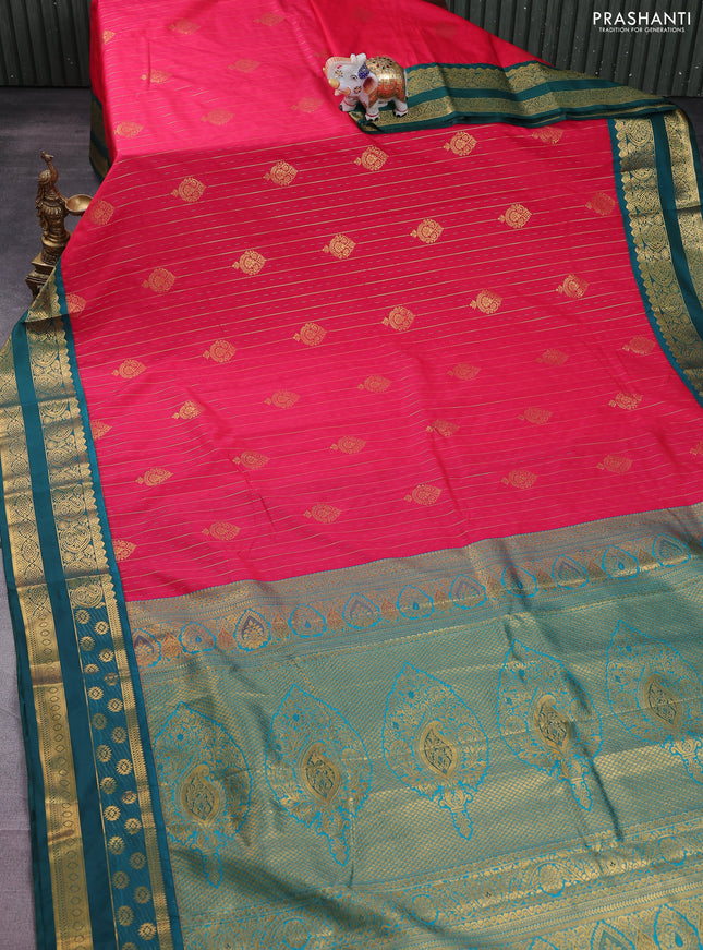Semi kanchipuram silk saree pink and peacock green with allover zari weaves & buttas and rettapet zari woven korvai border