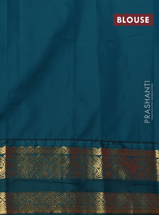 Semi kanchipuram silk saree pink and peacock green with allover zari weaves & buttas and rettapet zari woven korvai border