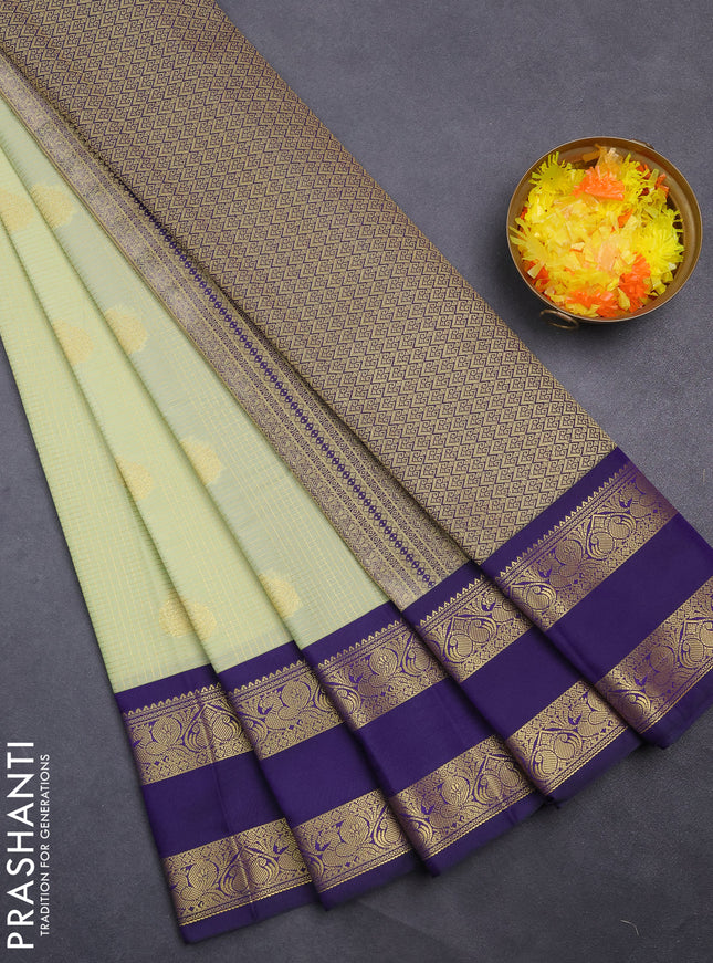 Semi kanchipuram silk saree pista green and blue with allover small zari checks & buttas and rettapet zari woven korvai border