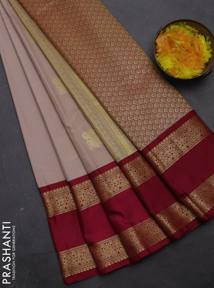 Semi kanchipuram silk saree beige and magenta pink with zari woven buttas and rettapet zari woven korvai border