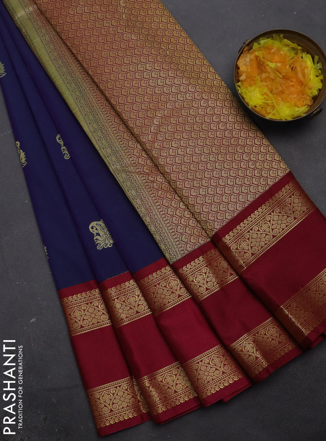 Semi kanchipuram silk saree navy blue and magenta pink with zari woven buttas and rettapet zari woven korvai border