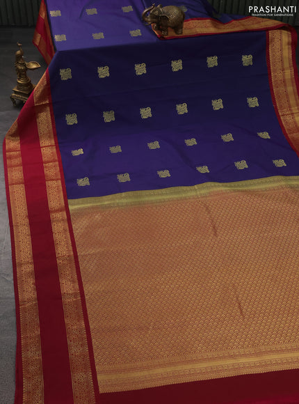 Semi kanchipuram silk saree navy blue and magenta pink with zari woven buttas and rettapet zari woven korvai border