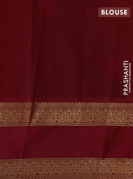 Semi kanchipuram silk saree navy blue and magenta pink with zari woven buttas and rettapet zari woven korvai border