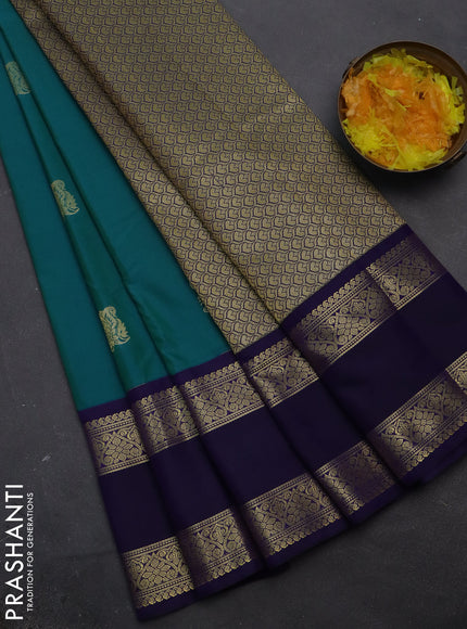 Semi kanchipuram silk saree dual shade of teal blue and navy blue with zari woven buttas and rettapet zari woven korvai border