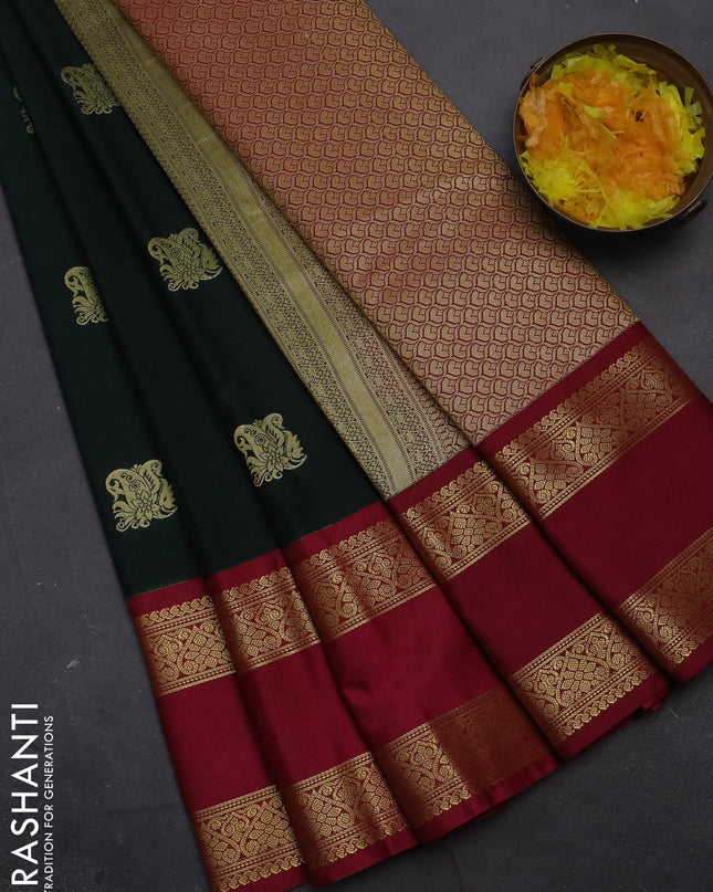 Semi kanchipuram silk saree bottle green and pink with zari woven buttas and rettapet zari woven korvai border