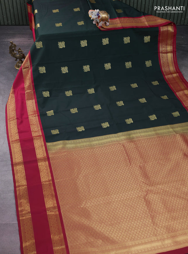 Semi kanchipuram silk saree bottle green and pink with zari woven buttas and rettapet zari woven korvai border