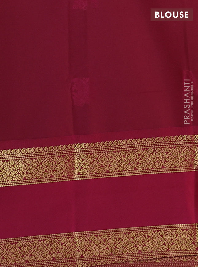 Semi kanchipuram silk saree bottle green and pink with zari woven buttas and rettapet zari woven korvai border