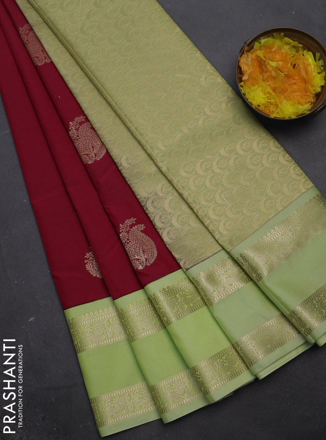 Semi kanchipuram silk saree pink and pista green with zari woven buttas and rettapet zari woven korvai border