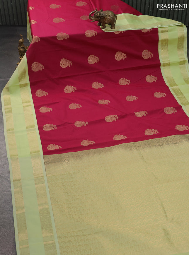 Semi kanchipuram silk saree pink and pista green with zari woven buttas and rettapet zari woven korvai border