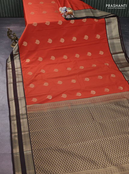 Semi kanchipuram silk saree orange and deep maroon with zari woven buttas and rettapet zari woven korvai border