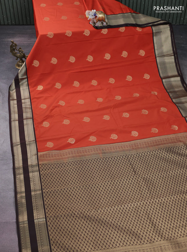 Semi kanchipuram silk saree orange and deep maroon with zari woven buttas and rettapet zari woven korvai border