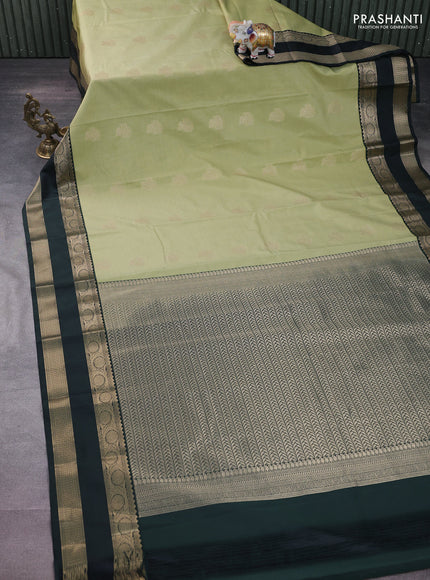 Semi kanchipuram silk saree pista green and bottle green with allover zari weaves and rettapet zari woven korvai border
