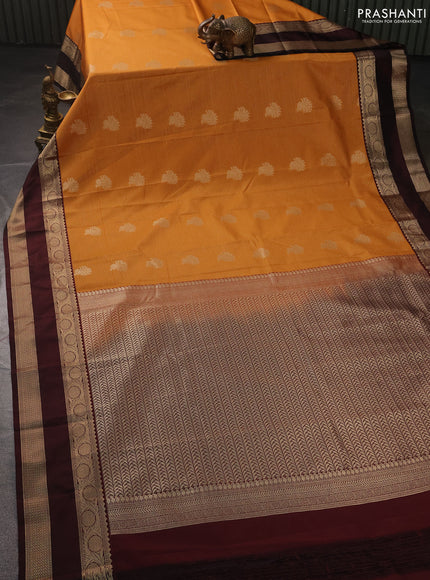 Semi kanchipuram silk saree mustard yellow and deep maroon with allover zari weaves and rettapet zari woven korvai border