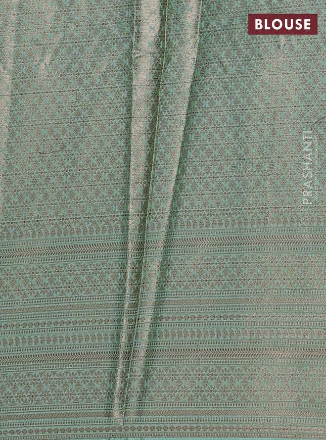 Banarasi warm silk saree bottle green and teal green with woven buttas and woven border