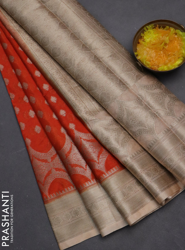 Banarasi warm silk saree orange and sandal with woven buttas and woven border