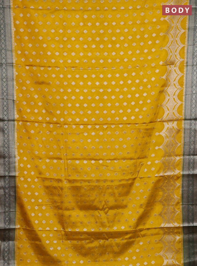 Banarasi warm silk saree mustard yellow and green with woven buttas and woven border