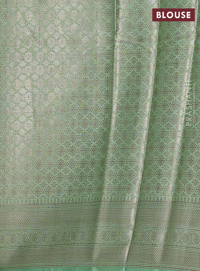 Banarasi warm silk saree dark green and pastel green with woven buttas and woven border