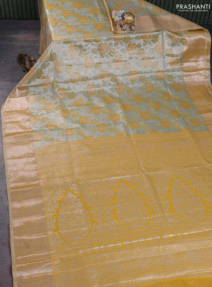 Bangalori tissue silk saree silver and mustard yellow with zari woven floral design brocade pattern and zari woven border