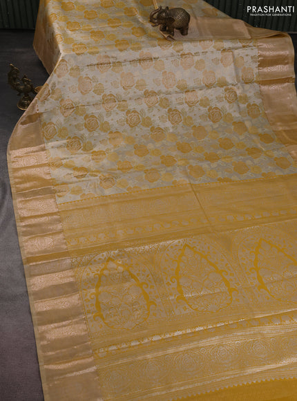 Bangalori tissue silk saree beige and mustard yellow with zari woven floral design brocade pattern and zari woven border