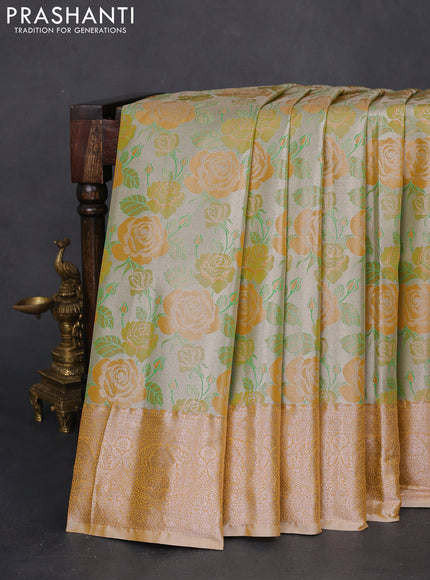 Bangalori tissue silk saree pastel grey and mustard yellow with zari woven floral design brocade pattern and zari woven border