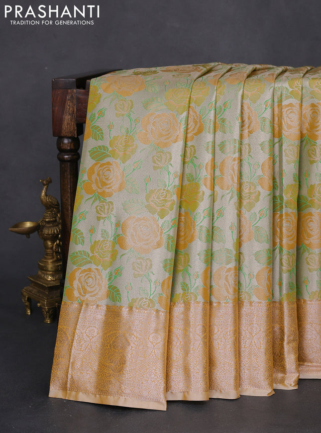 Bangalori tissue silk saree pastel grey and mustard yellow with zari woven floral design brocade pattern and zari woven border