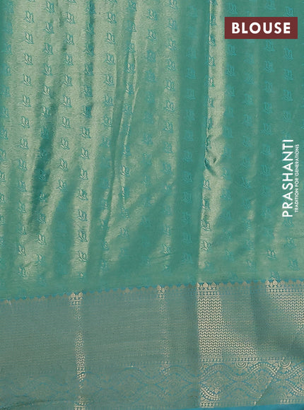 Bangalori tissue silk saree gold and teal blue with zari woven floral design brocade pattern and zari woven border