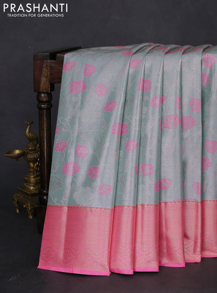 Bangalori tissue silk saree teal blue and light pink with zari woven floral design brocade pattern and zari woven border