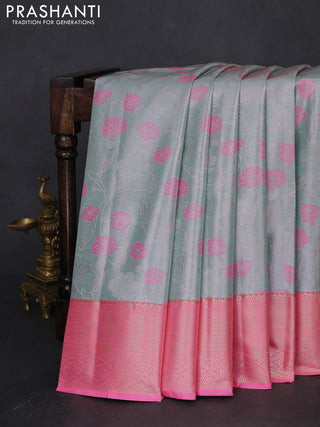 Bangalori tissue silk saree teal blue and light pink with zari woven floral design brocade pattern and zari woven border
