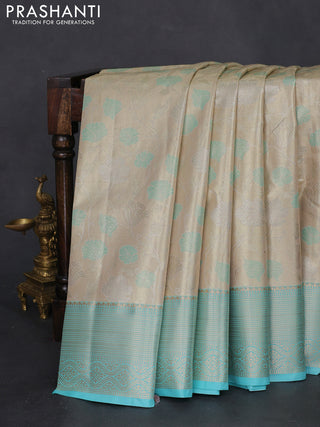 Bangalori tissue silk saree beige and teal blue with zari woven floral design brocade pattern and zari woven border