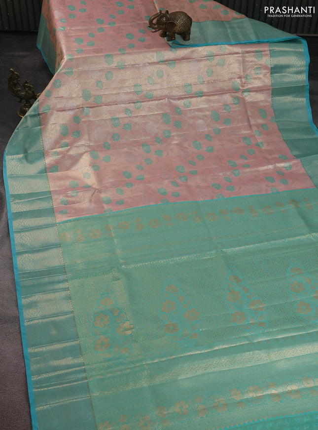 Bangalori tissue silk saree pastel peach and teal blue with zari woven floral design brocade pattern and zari woven border