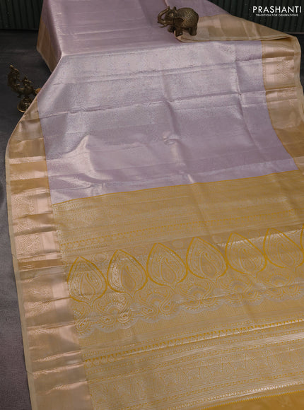 Bangalori tissue silk saree pastel lavender and mustard yellow with silver zari woven brocade weaves and zari woven border
