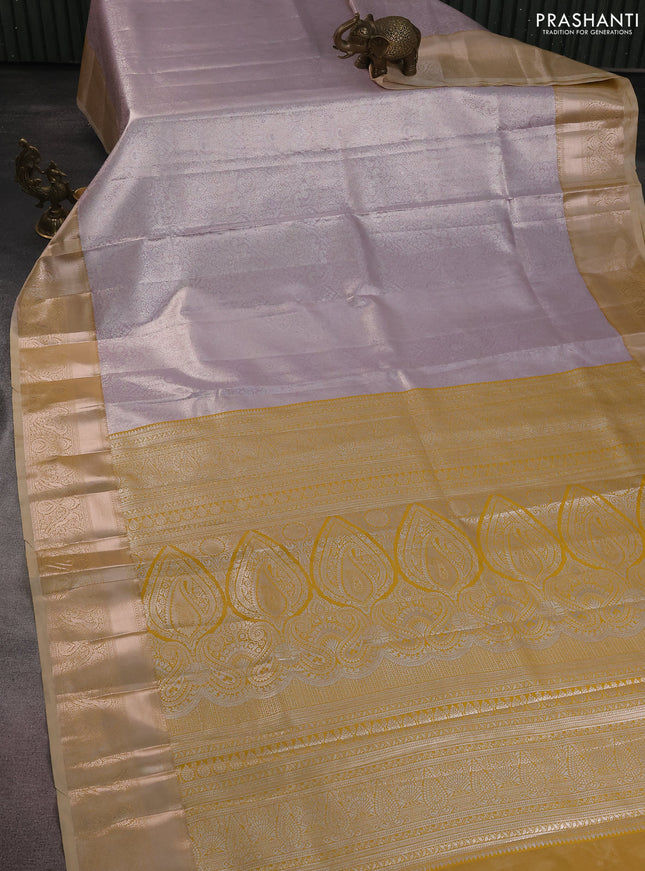 Bangalori tissue silk saree pastel lavender and mustard yellow with silver zari woven brocade weaves and zari woven border