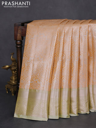 Bangalori tissue silk saree pale orange and mild pista green with silver zari woven brocade weaves and zari woven border