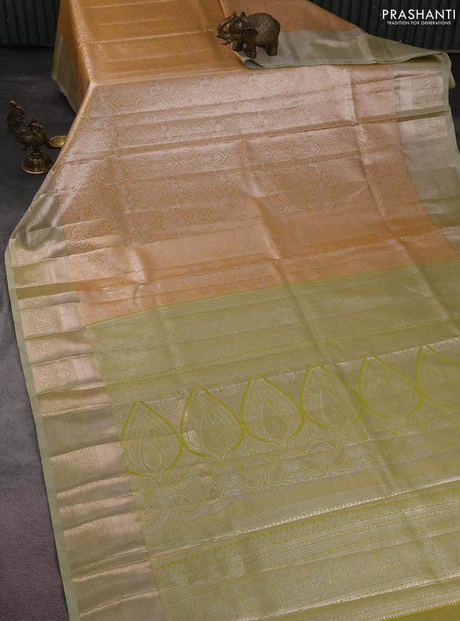 Bangalori tissue silk saree pale orange and mild pista green with silver zari woven brocade weaves and zari woven border
