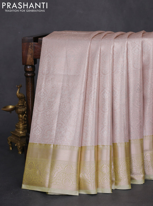 Bangalori tissue silk saree pastel peach and mild pista green with silver zari woven brocade weaves and zari woven border