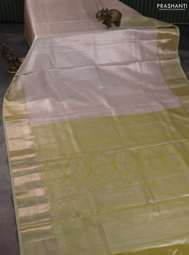 Bangalori tissue silk saree pastel peach and mild pista green with silver zari woven brocade weaves and zari woven border