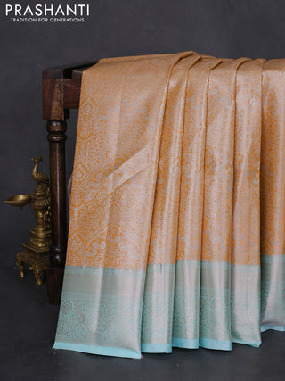 Bangalori tissue silk saree mustard yellow and teal blue with silver zari woven brocade weaves and zari woven border