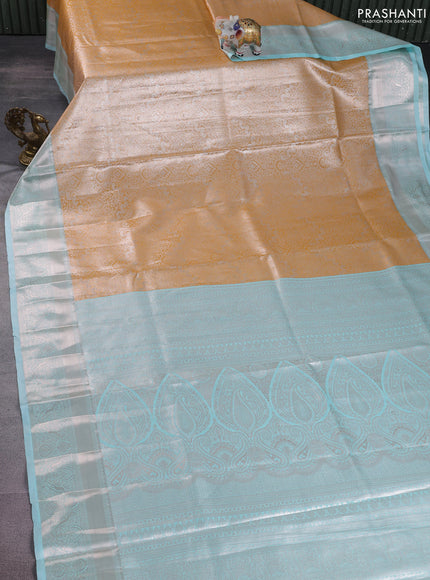 Bangalori tissue silk saree mustard yellow and teal blue with silver zari woven brocade weaves and zari woven border