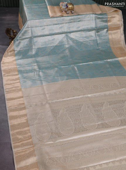 Bangalori tissue silk saree teal blue and cream with silver zari woven brocade weaves and zari woven border