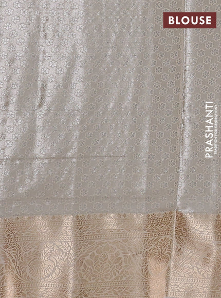 Bangalori tissue silk saree teal blue and cream with silver zari woven brocade weaves and zari woven border